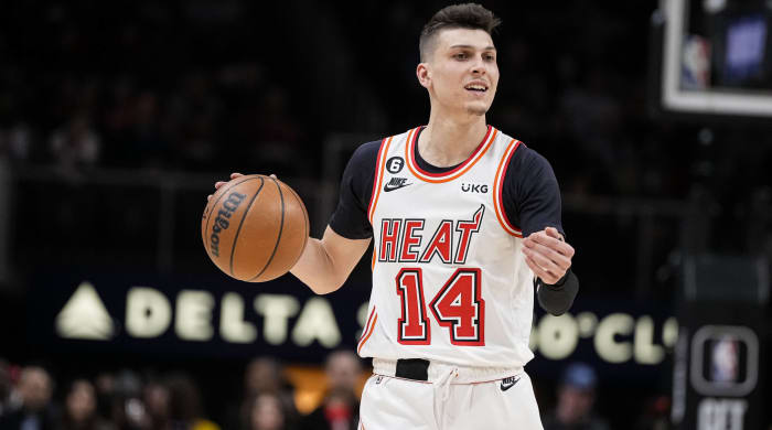 Heat guard Tyler Herro dribbles the ball in a game.